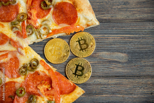 Bitcoin Pizza Day 22 May. Cryptocommunity holiday. concept of buying pizza with bitcoin. photo