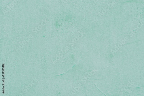 Cement painted wall background, baby-blue pastel color texture photo