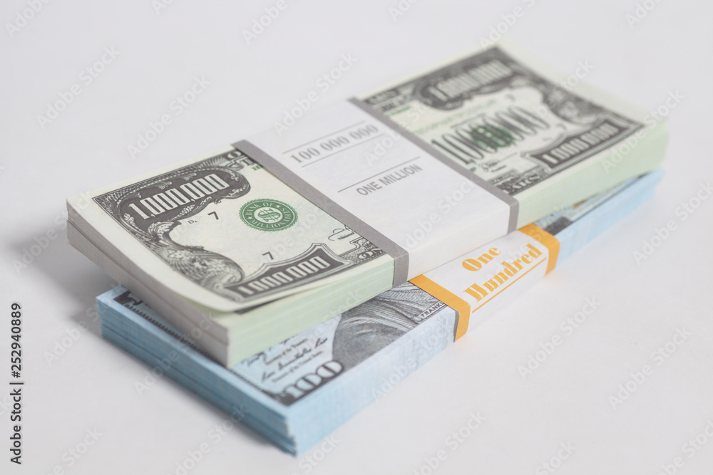 Denomination in one million and one hundred dollars bills with tape Denomination in one million and one hundred dollars bills with tape