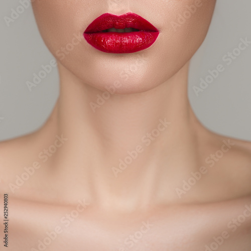 Close-up perfect natural lip makeup beautiful female mouth. Macro photo face detail.