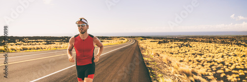 Obraz na płótnie Running man training for triathlon sport run race in Hawaii