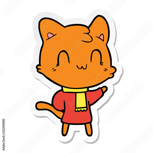 sticker of a cartoon happy cat wearing scarf