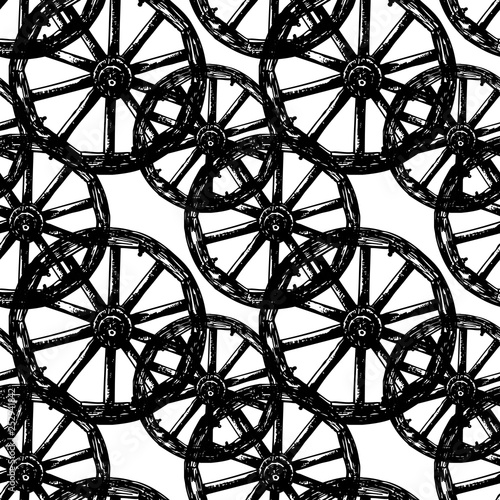 Seamless pattern of old wooden wheels