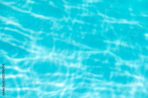 Blue water in swimming pool background