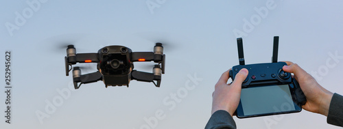 Wallpaper Mural Drone in the sky with remote controller Torontodigital.ca