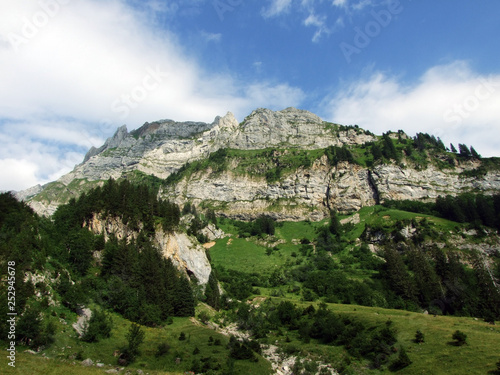 Alpine landscape and rocky peaks of Alpstein mountain range - Cantons of St. Gallen and Appenzell Innerrhoden, Switzerland photo