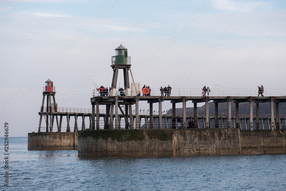 Fisherman, entrance to harbour, Whitby