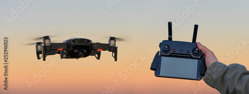 Wallpaper Mural Drone in the sky with remote controller Torontodigital.ca