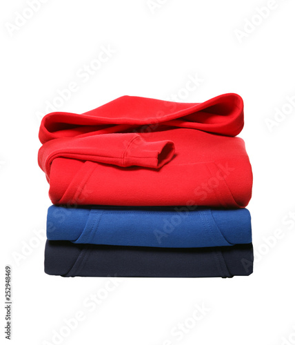 stack of hooded sweater isolated on white