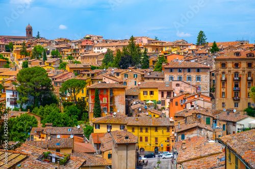 Perugia, Italy - Panoramic view of the Perugia historic quarter with medieval houses and academic quarter of University of Perugia and other academies photo