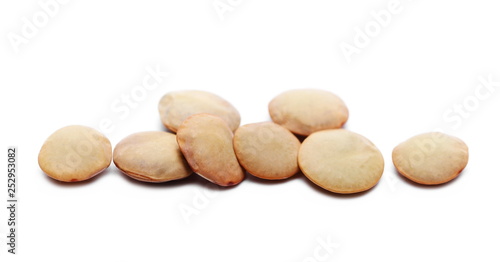 Pile of green lentils macro isolated on white background