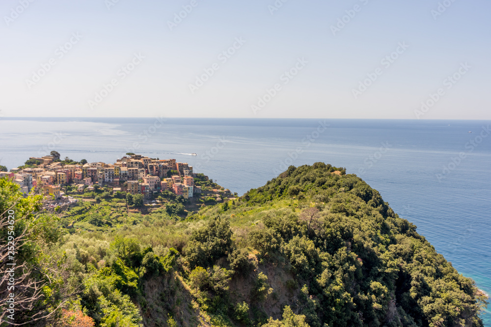 Italy, Cinque Terre, Corniglia, HIGH ANGLE VIEW OF BUILDINGS AND SEA AGAINST SKY