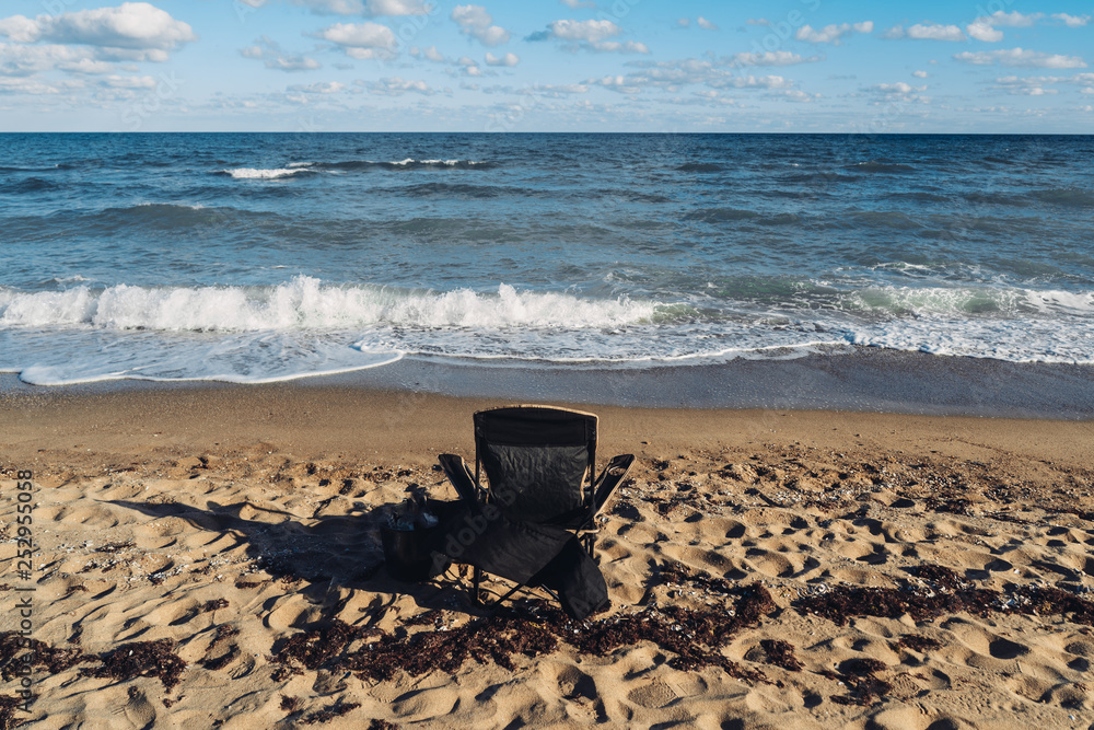 Fisherman's chair on the beach. Beautiful view of the sea Fisherman's chair on the beach. Beautiful view of the sea