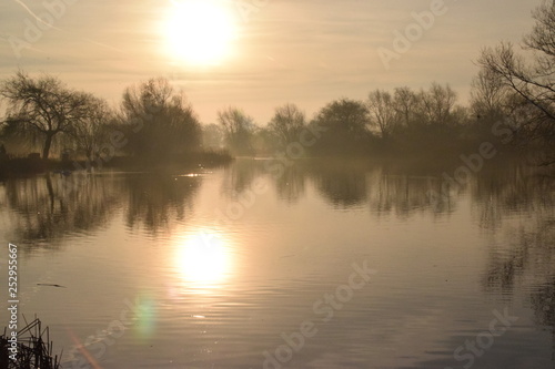 Misty Sun Rise over Lake