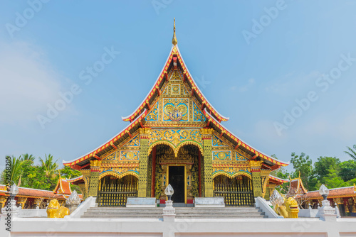 The sanctuary, Wat Wang Kham Temple, Khao Wong District, Kalasin Province, with the blue sky cloud.The public property in Thailand.