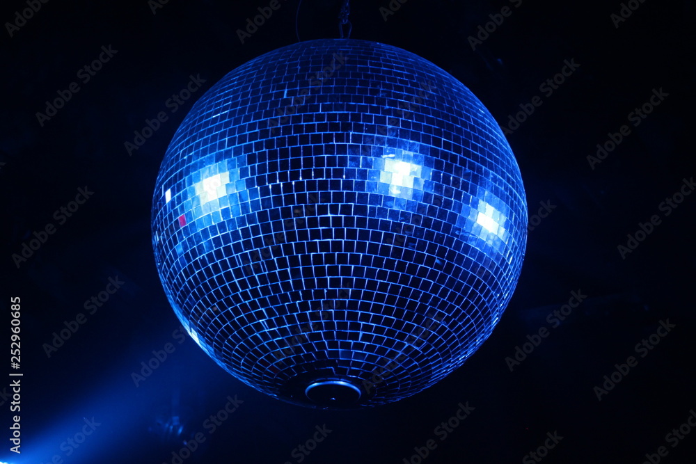 Obraz premium disco ball on blue background