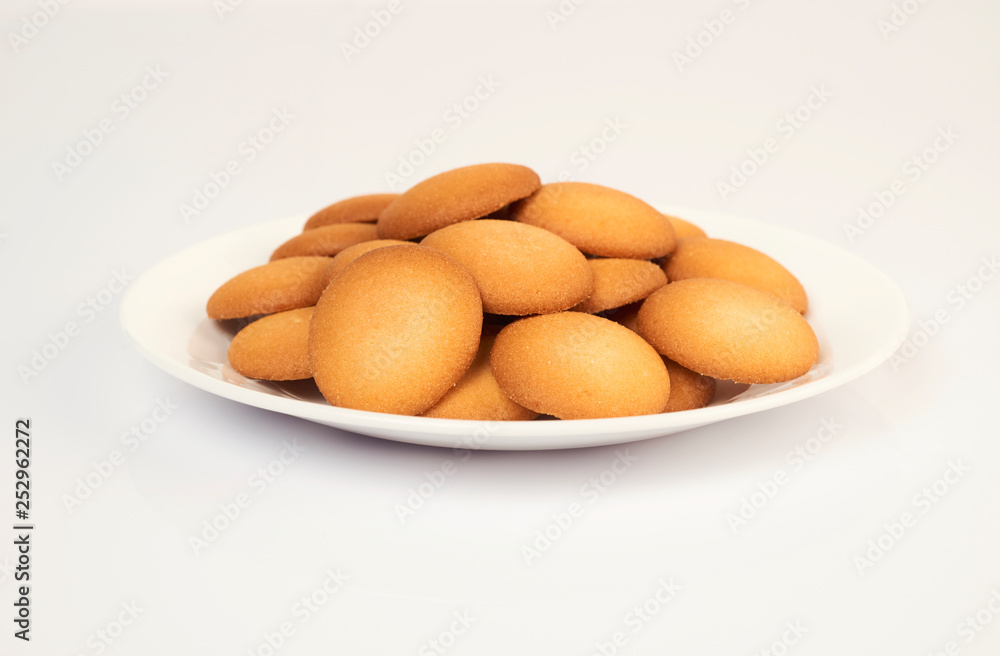 Many cookies on a white plate Many cookies on a white plate
