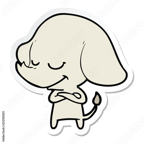 sticker of a cartoon smiling elephant with crossed arms