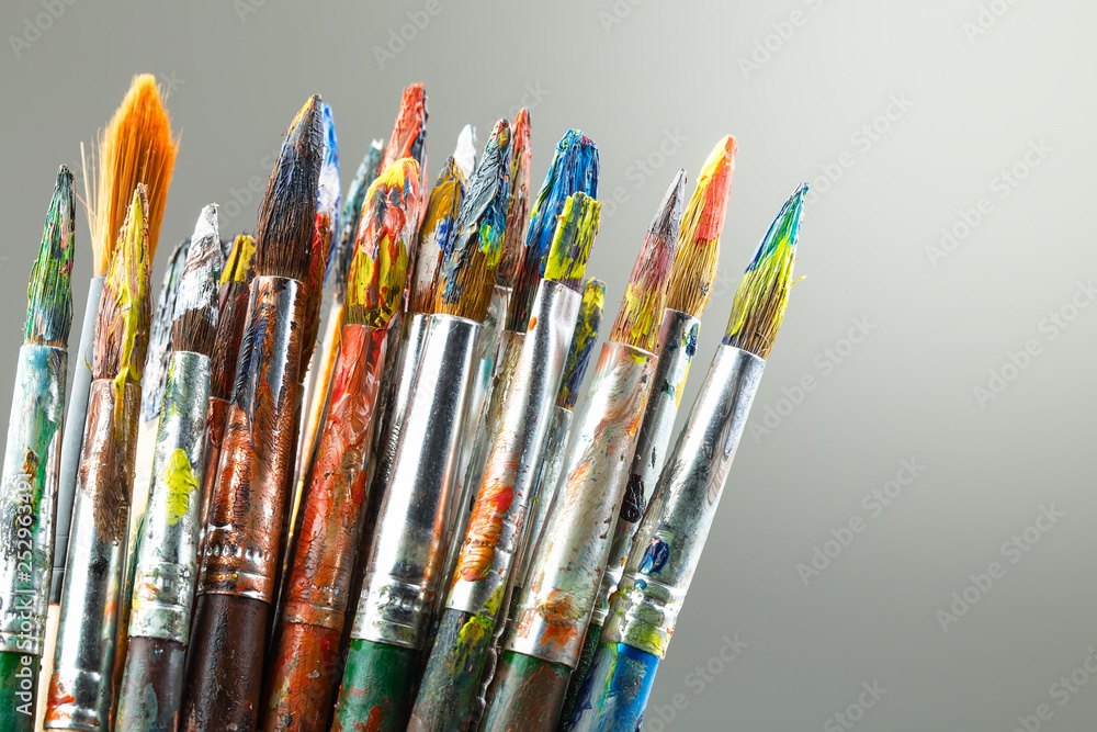 Fototapeta premium Paint brushes and paints for drawing.