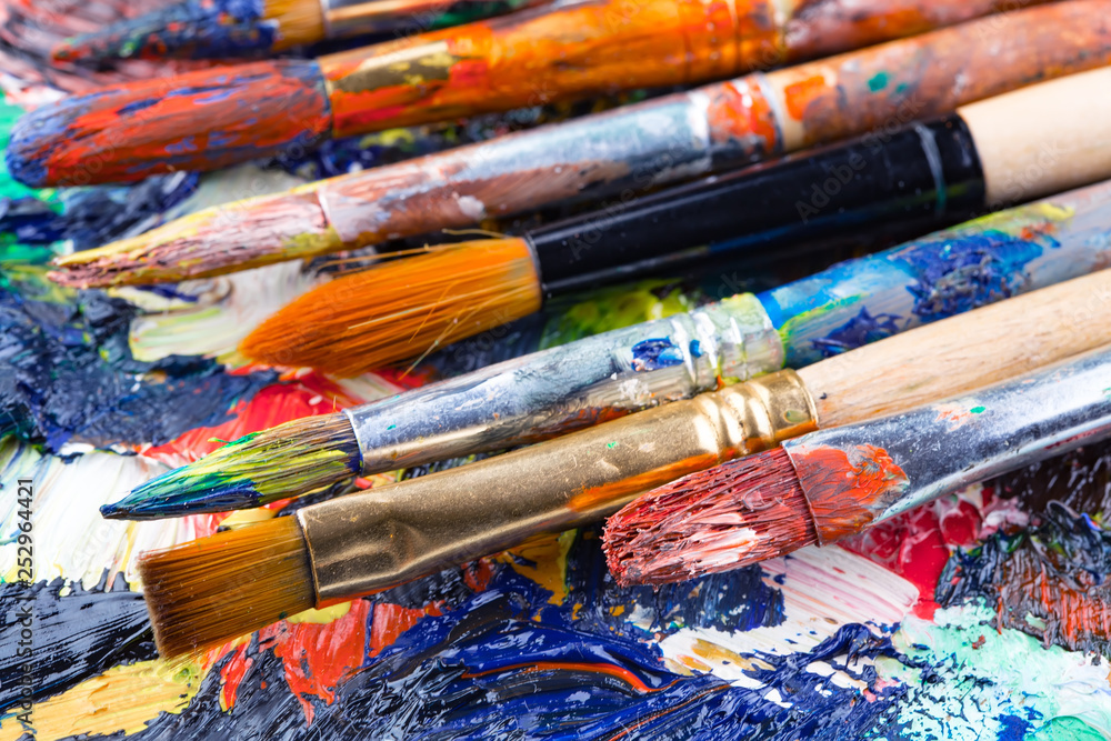 Fototapeta premium Paint brushes and paints for drawing.