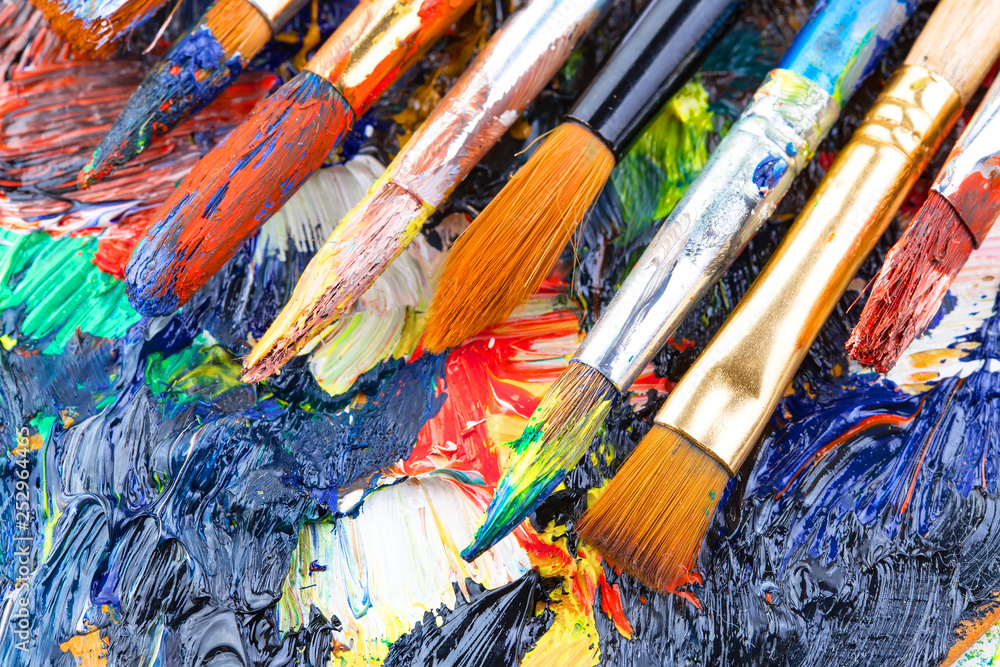 Fototapeta premium Paint brushes and paints for drawing.