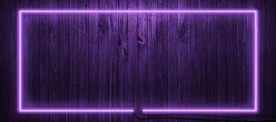 Neon light on wooden wall background.