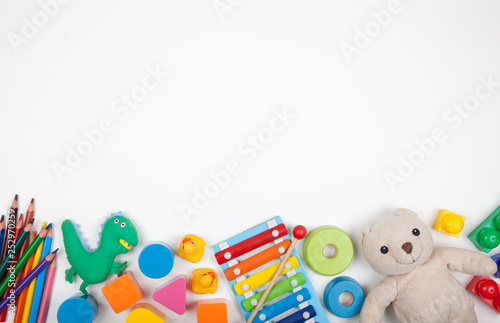 Baby kids toys on white background with copy space for text