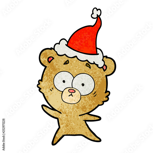 anxious bear textured cartoon of a wearing santa hat