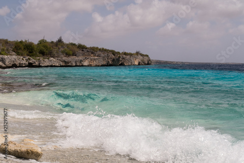 beach of broken corals on the west coast of the tropical island Bonaire in the Caribbean
