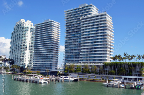 Luxury condo rental and condominium towers overlooking a small marina on the Florida Intra-Coastal waterway on Miami Beach,Florida © Wimbledon