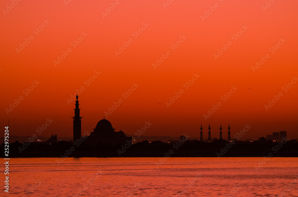 Silhouette of a mosque during sunset
