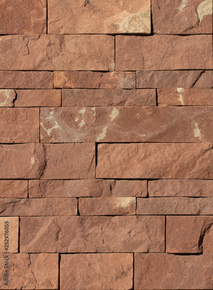 Obraz premium Orange facing stone, slate, sandstone and travertine marble texture