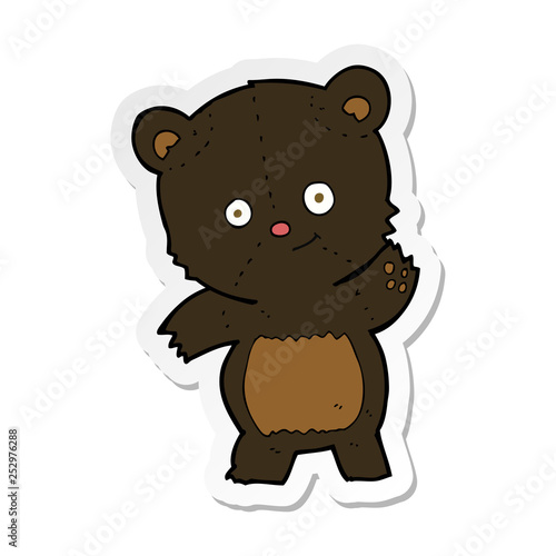Fototapeta Naklejka Na Ścianę i Meble -  sticker of a cute black bear cartoon