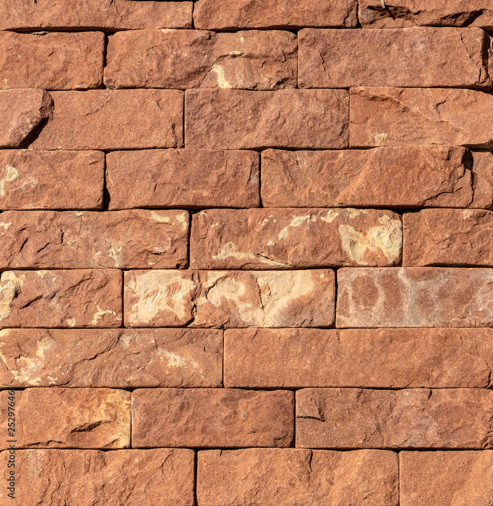 Obraz premium Orange facing stone, slate, sandstone and travertine marble texture