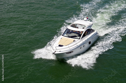 angled overhead view of a high-end cabin cruiser