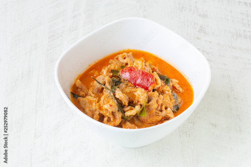 Panang Curry with Pork on white background.