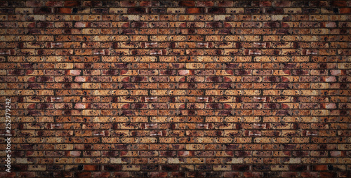 Old brick wall. Horizontal wide brick wall background.