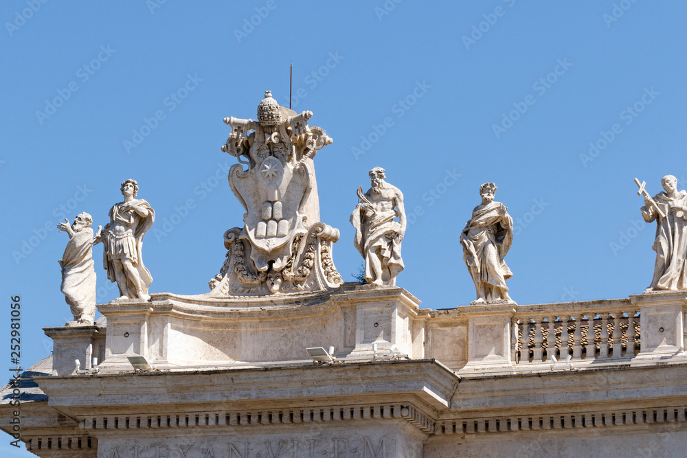 Bernini's sculptures on top of the colonnade in  Piazza San Pietro (St. Peter's Square) in the Vatican City