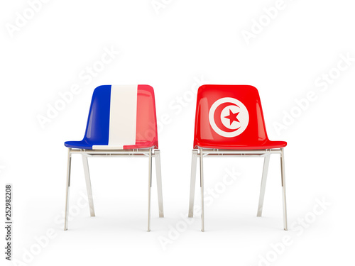 Two chairs with flags of France and tunisia