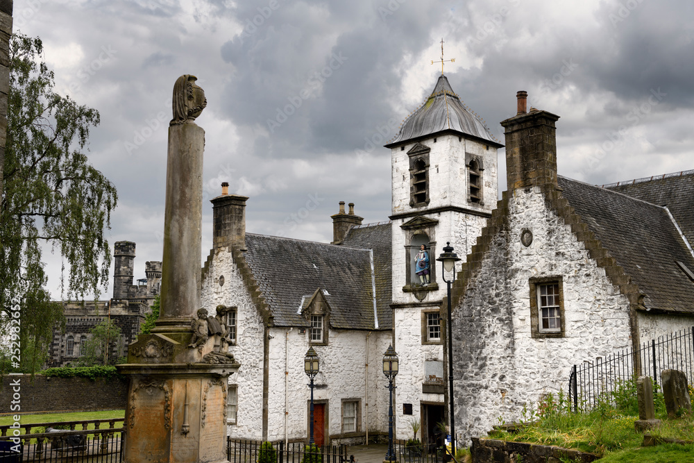 17th Century Burgh architecture of Cowanes Hospital with statue of John Cowane at Holy Rude Old Town cemetery and Stirling Jail Scotland