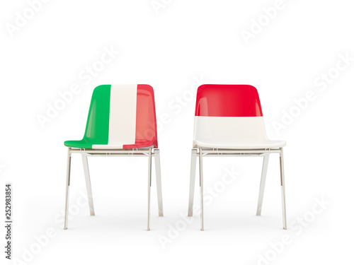 Two chairs with flags of Italy and indonesia