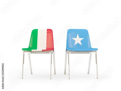 Two chairs with flags of Italy and somalia