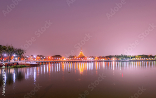 Beautiful lighting of Wat Nong Wang temple and reflection on the water at Khonkaen province,Thailand.