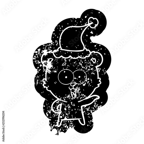 Fototapeta Naklejka Na Ścianę i Meble -  laughing teddy  bear cartoon distressed icon of a wearing santa hat