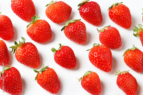 Pattern of strawberries isolated on white background, creative background
