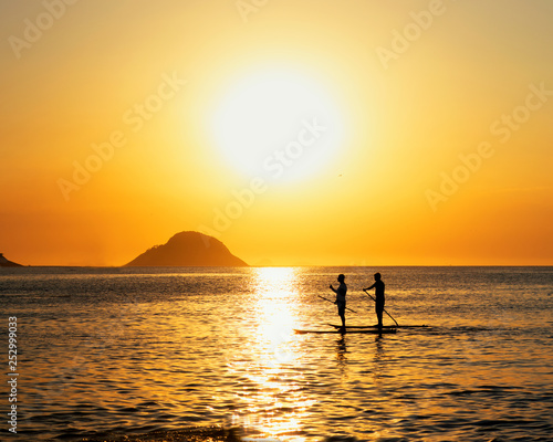 Fototapeta Naklejka Na Ścianę i Meble -  Stand Up Paddle at Sunset
