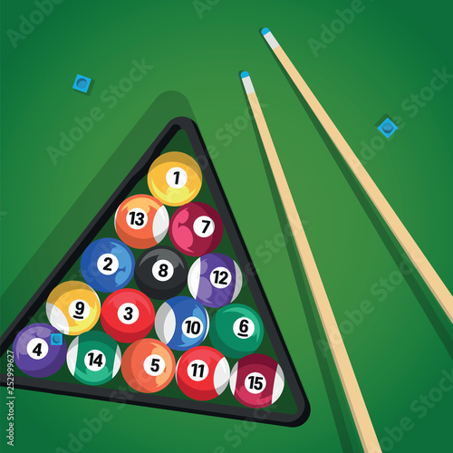 Billiard cue and pool balls in triangle on green table while game. Biliard balls, triangle and pool stick for game on green table top view.