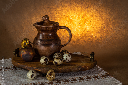 Festive Easter still life with eggs and earthenware jug. Blank for cards.