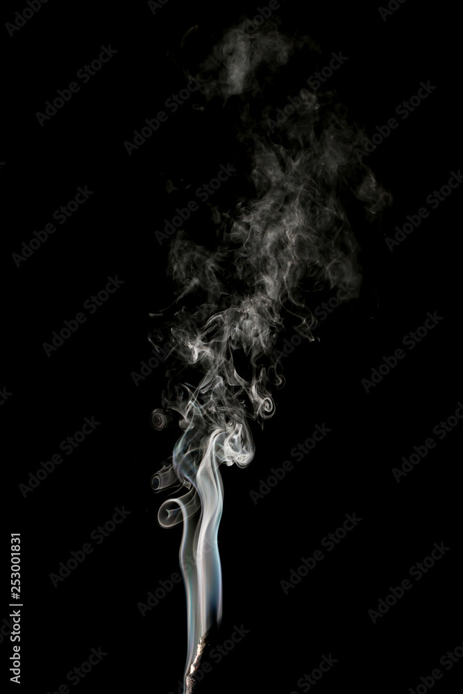 jet of smoke on a black background jet of smoke on a black background