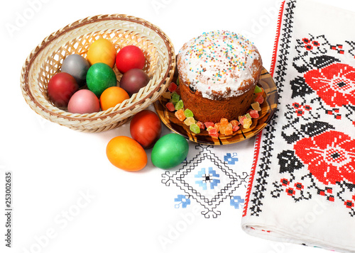 Easter holiday. Easter bread and eggs on a white tablecloth with patterns